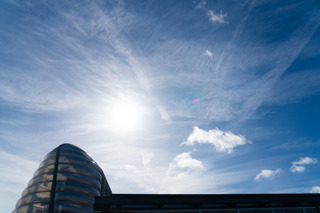 Partial Solar Eclipse 2025 with NSC building in view.