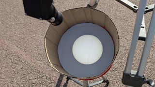 A telescope is used to project the Partial Solar eclipse in 2025 from NSC car park.