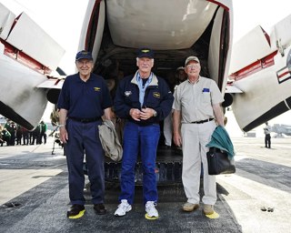 Lovell (Left), Gene Cernan (Center), and Neil Armstrong During the 2010 Legends of Aerospace Tour Aboard the Aircraft Carrier USS Harry S. Truman.