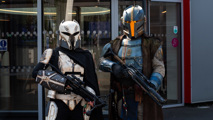 Two Mandalorians stand guard outside the National Space Centre at Galactic Gathering