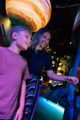 Mother and son enjoy an interactive challenge in the Solar System gallery