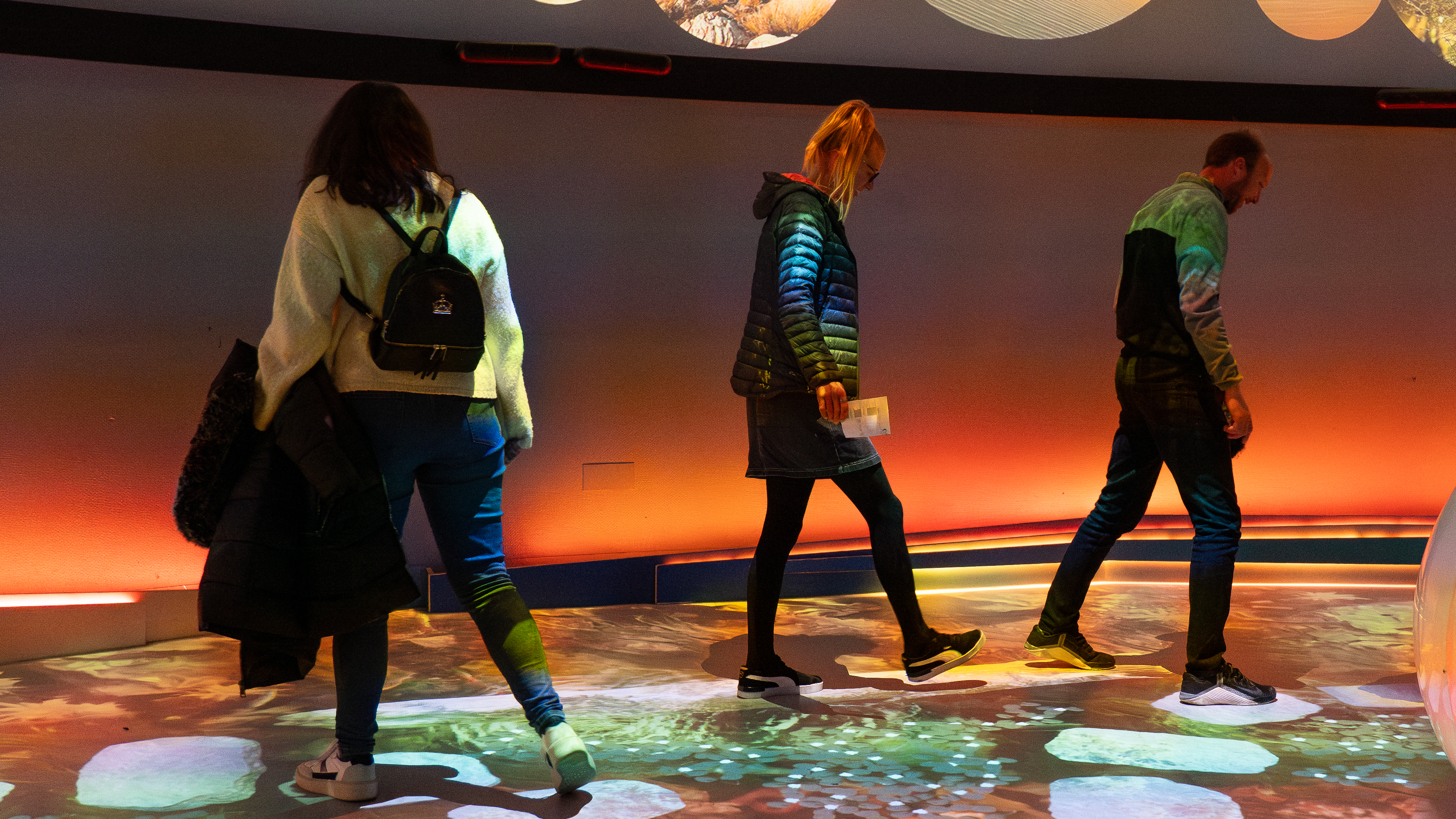 Adults in Home Planet gallery at Space Lates event