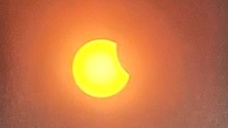 Partial Solar Eclipse 2025 taken through an eclipse viewer.