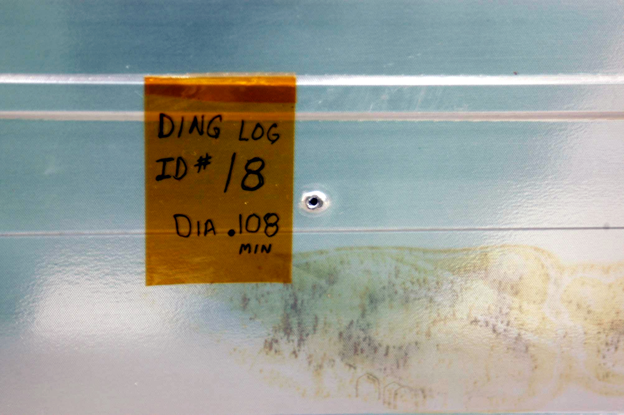 Hole in Space Shuttle Atlantis caused by a meteoroid 