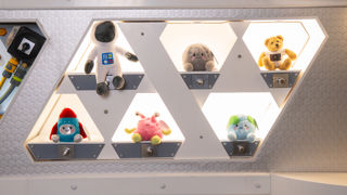 Selection of gifts from Santa on shelves in the Mars Lab