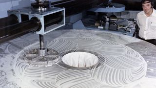 Hubble Space Telescope's primary mirror being polished at the Perkin-Elmer Corporation's large optics fabrication facility, US.