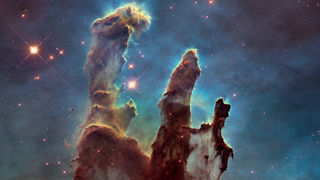 Pillar of Creation found within the Eagle nebula taken by the Hubble Space Telescope.