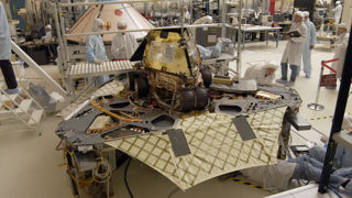 Rover 1 on top of it’s lander in a stowed position showing the DVD assembly on the front left petal.