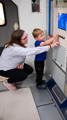 Mother and small child in the Columbus Module at Small Space Day