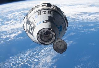 Starliner Spacecraft approaching the International Space Station. 