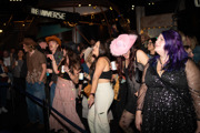 Group of people line dancing at Cosmic Country