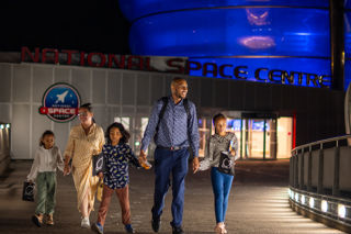 Family departing the National Space Centre