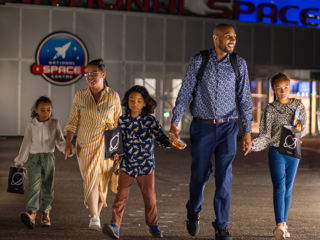 Family departing the National Space Centre