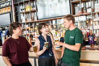 Eilish, Kat and Isaac Drinking Beer at Everard's