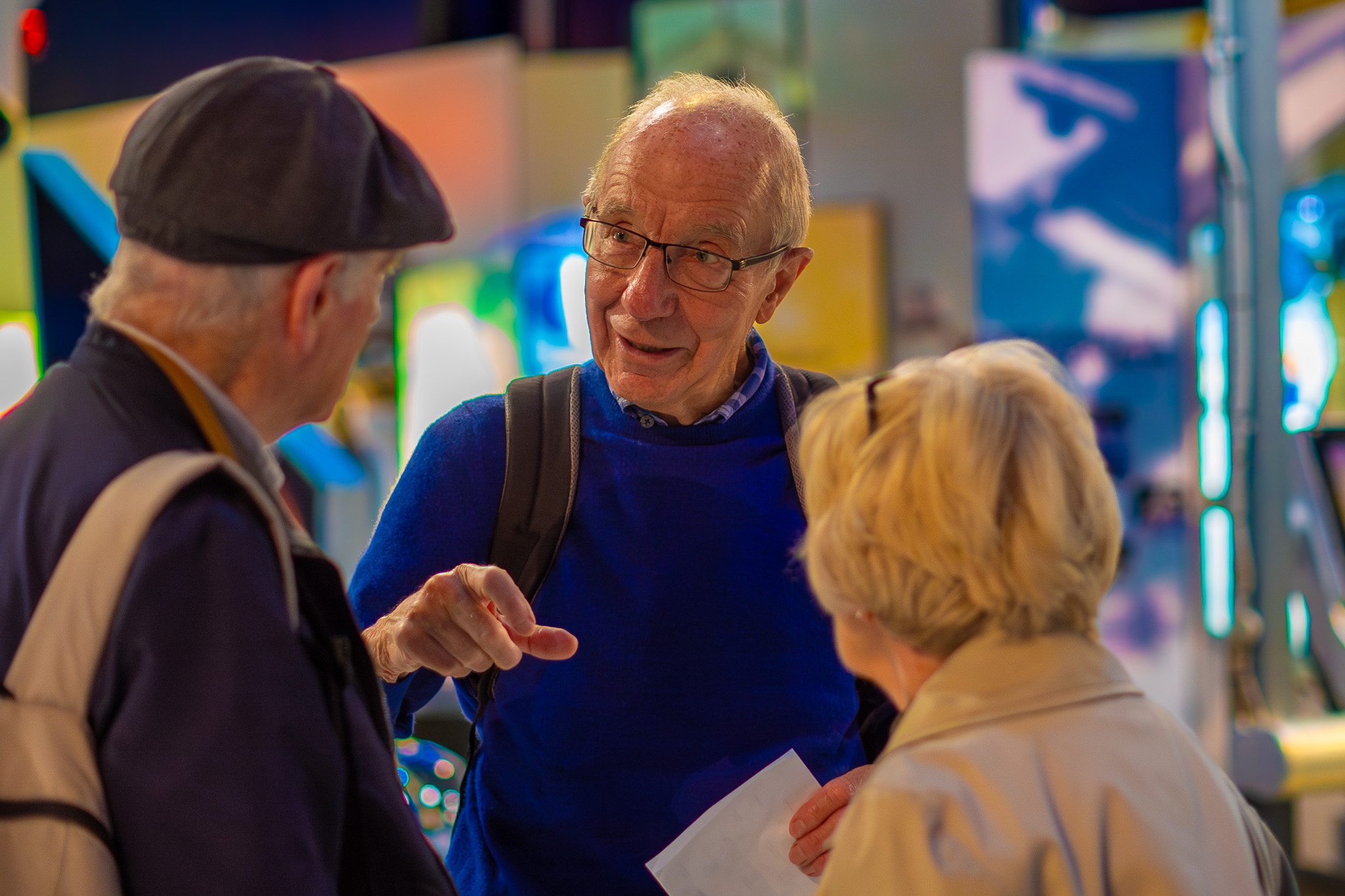 Older group chat on a visit to the National Space Centre
