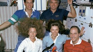 The crew of Space Shuttle mission STS-32 with Snoopy.