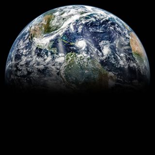 Earth with hurricanes over the Atlantic. 