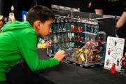 Young boy looks at LEGO Ironman display at the Brickish Weekend