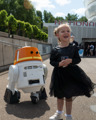 Happy young girl in a Darth Vader dress with Chopper at Galactic Gathering