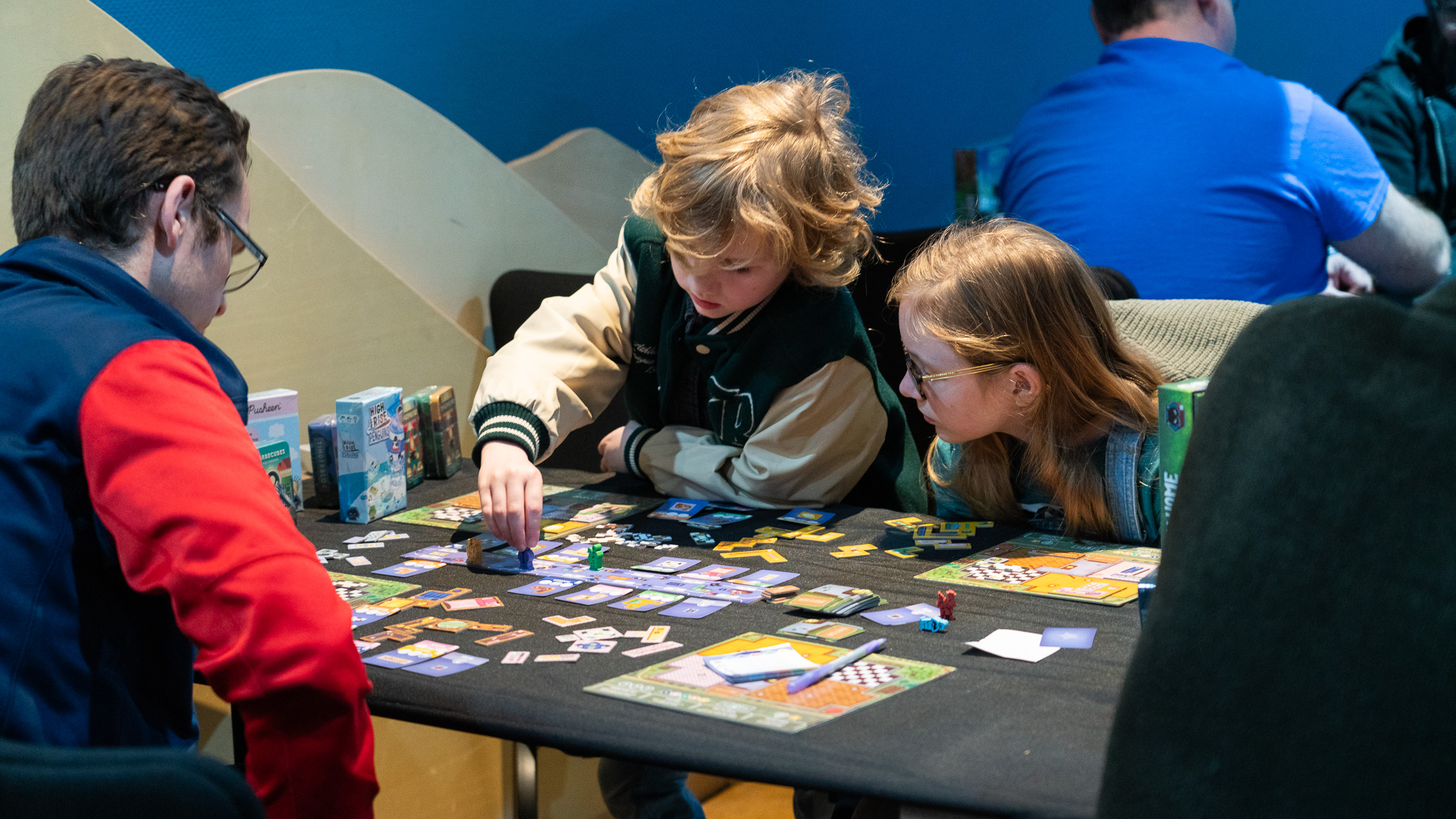 Two children join Alley Cat Games at To Boldly Game