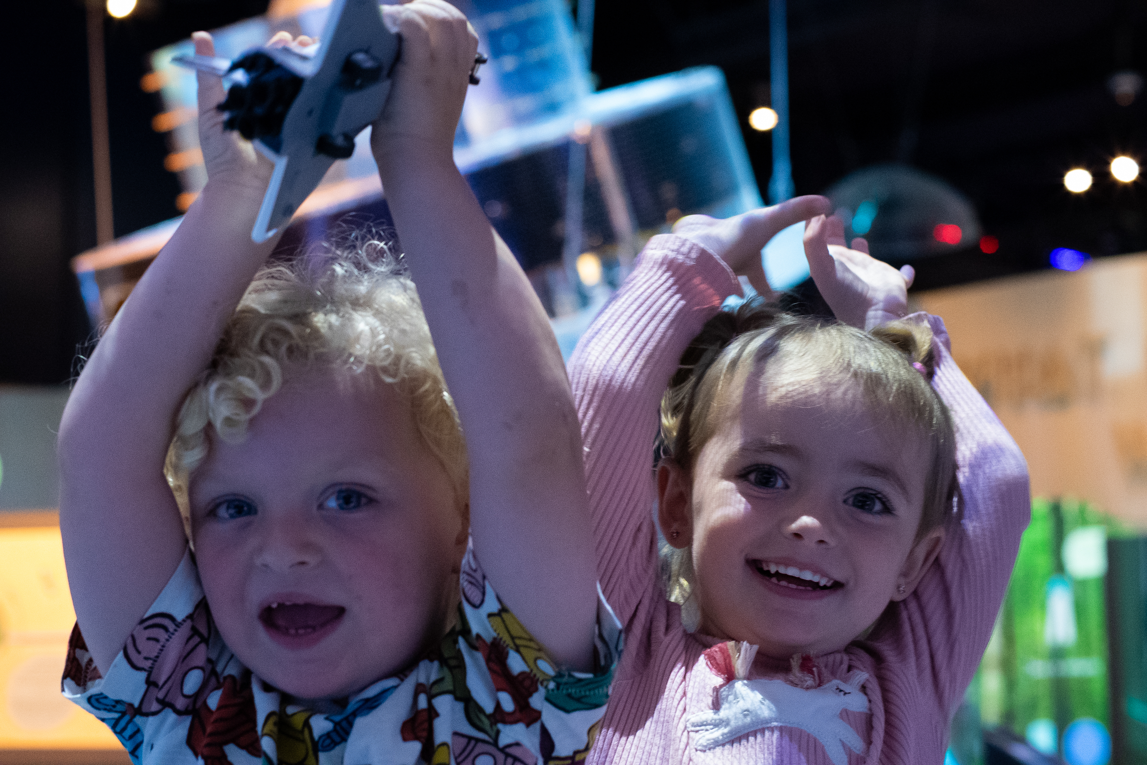 Two small children in Home Planet at Small Space Day