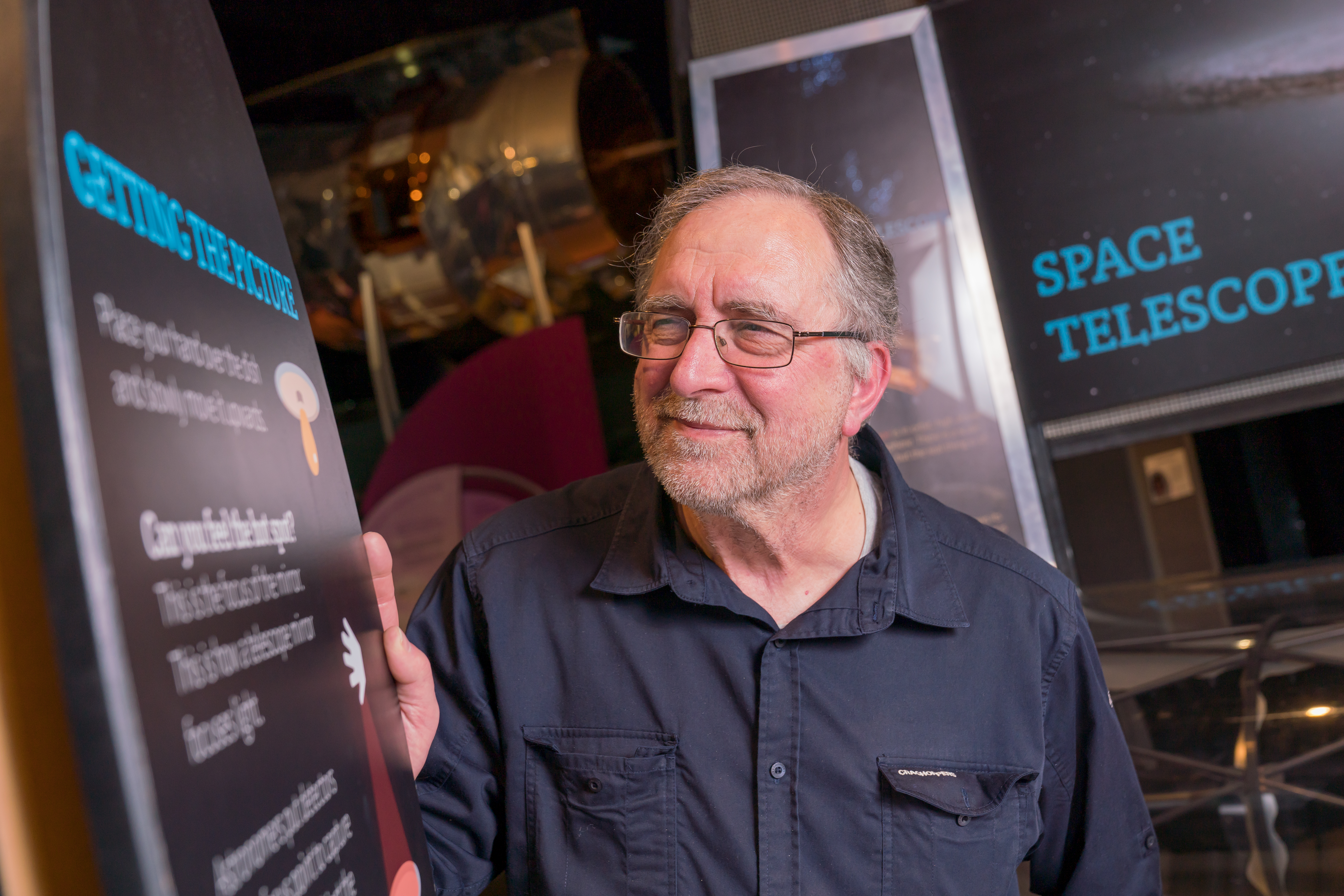 Older man enjoying The Universe gallery